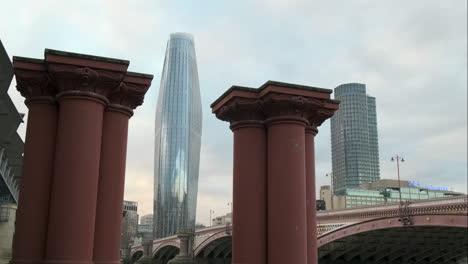 Blackfriars-Bridge-before-Restoration-and-Bankside-Yards-Development,-with-One-Blackfriars,-aka-Boomerang-Building,-Between-Old-Bridge-Pillars,-Columns