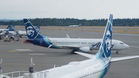 Aerial-shot-of-Alaska-airline-airplane-moving-towards-the-take-off