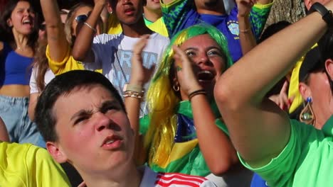 woman-wearing-a-Brazilian-flag-celebrate-the-victory-of-Brazil-x-Croatia-on-the-first-match-in-Doha