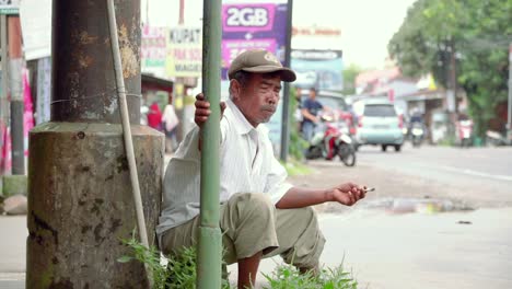 Poor-man-on-the-side-of-the-road