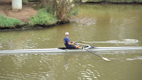 Tel-Aviv-Israel-Nov-22:-Man-Kayaking-at-haYarkon-river-under-Bird-Head-Bridge-in-Tel-Aviv,-Israel