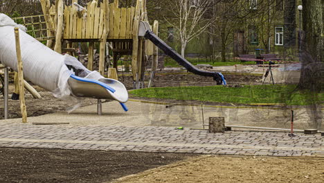 Installing-paver-bricks-and-stones-over-a-gravel-base-at-a-new-playground---time-lapse