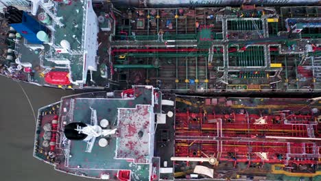 Shipyard-and-dry-dock-facility-Saigon-river-Vietnam-tracking-shot-over-large-tankers-being-repaired