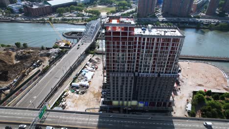 Aerial-view-around-the-Bronx-point-and-Harlem-river,-in-sunny-NYC,-USA---circling,-drone-shot