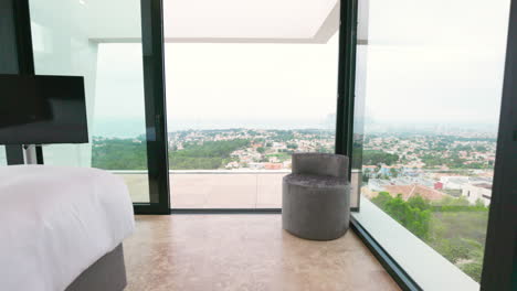 POV-Walking-Through-Bedroom-Out-To-Balcony-With-Pan-Right-To-Reveal-Swimming-Pool-At-Modern-Villa-In-Calp,-Spain