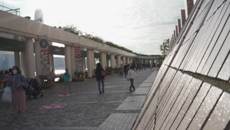 People-walking-in-front-of-Hong-Kong-Culture-Center-Architecture