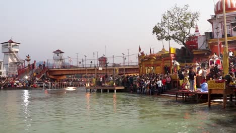 holy-ganges-river-evening-aarti-with-devotee-gathered-for-pryer-video-is-taken-at-har-ki-pauri-haridwar-uttrakhand-india-on-Mar-15-2022