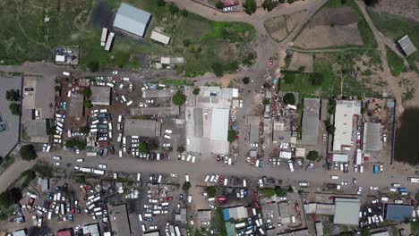 Drone-video-of-a-car-repair-business-area-at-a-high-density-suburb-township-in-Bulawayo,-Zimbabwe