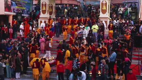 holy-ganges-river-evening-aarti-with-devotee-gathered-for-pryer-video-is-taken-at-parmarth-niketan-rishikesh-uttrakhand-india-on-Mar-15-2022