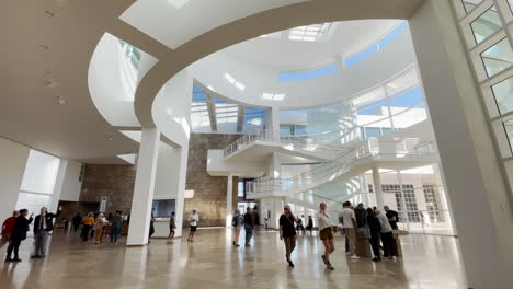 Guests-stroll-through-the-lobby-of-the-Getty-Museum-in-Brentwood-Los-Angeles,-California