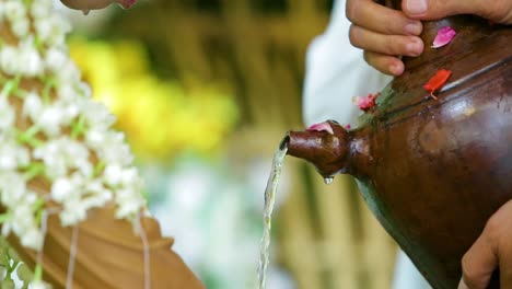 The-bride-performs-ablution-followed-by-mom-and-dad