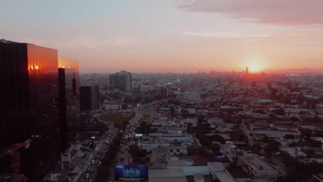 Aerial-shot-of-the-city-from-La-Molina-District-at-golden-hour