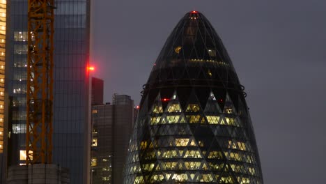 Gherkin-close-up-at-night,-London-UK