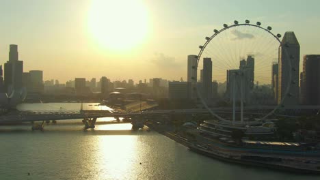 Aerial-Footage-of-Singapore-Cityscape-featuring-famous-tourist-attractions-in-Marina-Bay