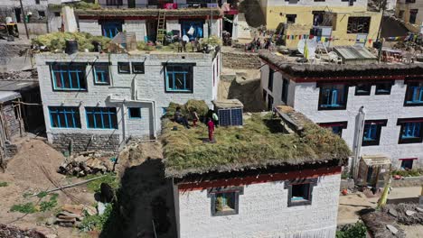 Dronie-shot-of-himalayan-kids-in-mudh-village-,-pin-valley