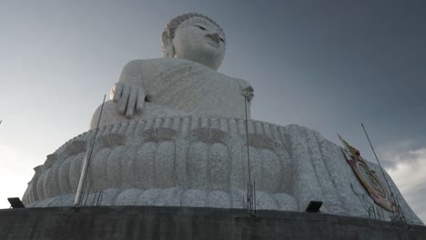 Movement----Landmark-and-viewpoint-Big-Buddha-Phuket,-Thailand----Slideshow-from-side----Bird-crossing-blue-sky----Stabilized-full-HD-wide-angle-shot