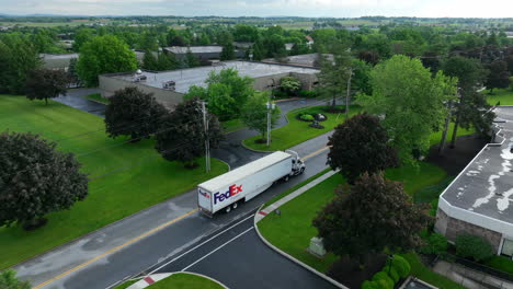 Aerial-tracking-shot-of-Fedex-18-wheeler