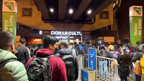 Large-number-of-stressed-people-walking-toward-Estacion-La-Cultura-of-the-Lima-metro-station-in-Peru-that-travels-from-Villa-El-Salvador-to-Bayovar