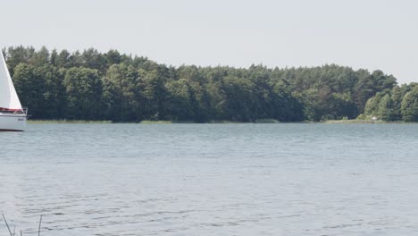 Boat-sailing-On-Wdzydze-Lake-In-Poland---wide,-static