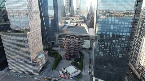 An-aerial-view-of-the-Vessel,-known-as-the-Hudson-Yards-Staircase-on-a-sunny-day