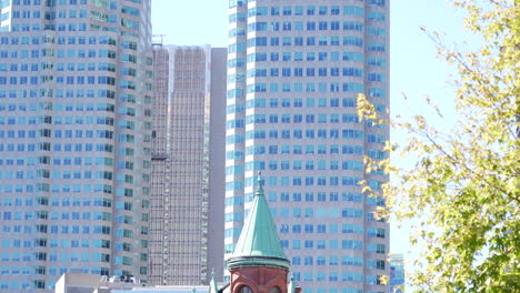 Pan-down-onto-The-Gooderham-Building,-also-known-as-the-Flatiron-Building-in-Downtown-Toronto,-Canada