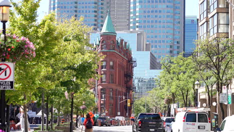 The-Gooderham-Building,-also-known-as-the-Flatiron-Buildings-Downtown-Toronto,-Canada-Wide-Static-shot