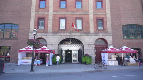 Pan-down-on-St-Lawrence-Market-Toronto-Front-Entrance-4K