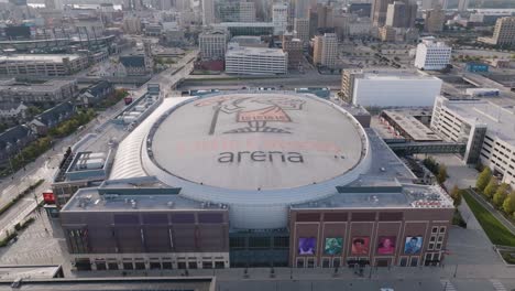 Little-Caesars-Arean-top-tilt-up-to-reveal-Detroit-Skyline