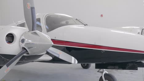 A-Piper-PA-34-Seneca-Twin-Engine-Airplane-Parked-in-the-Hanger