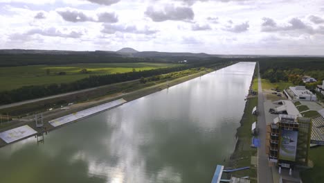 Drone-shot-of-artificial-water-channel-in-Racice-sports-complex,-Czech-Republic