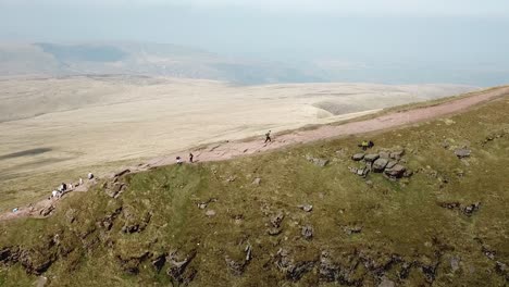 Drone-is-rising-up-above-brecon-beacon-valley-giving-spectacular-view-of-valley