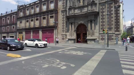 One-of-the-streets-that-get-to-the-Zocalo-in-Mexico's-City-downtown-with-the-cathedral-in-the-back