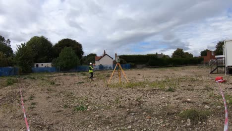 Surveyor,-Site-Engineer-doing-survey-with-Leica-total-station-on-construction-site-prior-works