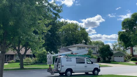 Xfinity-Comcast-technician-van-parked-in-neighborhood-on-a-sunny-day,-no-body