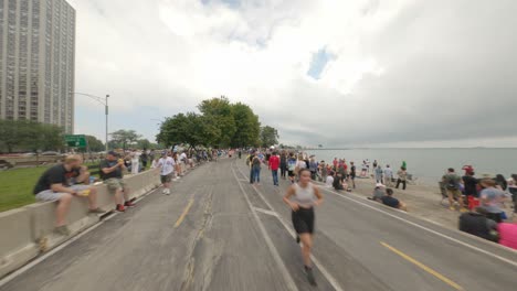 Crowds-on-the-Lakefront-Trail-waiting-for-The-2022-Chicago-Air-and-Water-Show-after-hours-of-weather-delay-due-to-poor-visibility-and-rain