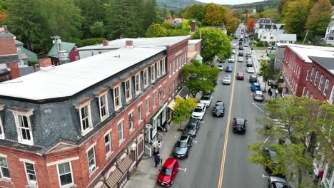 Rotational-aerial-shot-of-quaint-small-town-main-street