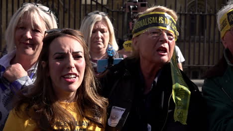 In-slow-motion-Stella-Assange-joins-in-with-Julian-Assange-supporters-chanting-slogans-as-protestors-form-a-human-chain-around-the-Houses-of-Parliament-calling-for-his-release-from-prison