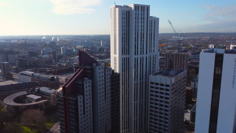 Aerial-Drone-shot-of-university-student-accommodation-in-Leeds-City-Centre-near-Leeds-arena-looking-over-Leeds-City-Centre