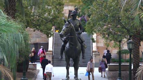 Close-up-shot-at-Anzac-square-during-peak-hours,-office-workers-rushing-home,-walking-fast-towards-central-railway-station,-underground-subway-at-downtown-Brisbane-city,-central-business-district