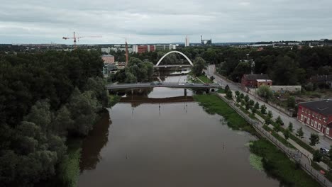 flying-drone-towards-bridge-on-emajogi-in-tartu