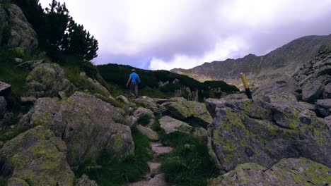 Man-Hiking-in-Retezat-Mountains,-Romania