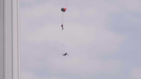 Base-jumpers-jumping-from-Menara-tower-in-Kuala-Lumpur