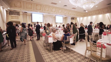 Wide-shot-of-a-crowded-banquet-hall-at-an-event