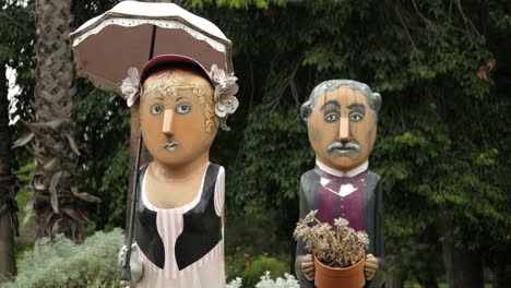 Wooden-bollard-sculptures-at-Geelong-Botanical-Gardens,-Australia