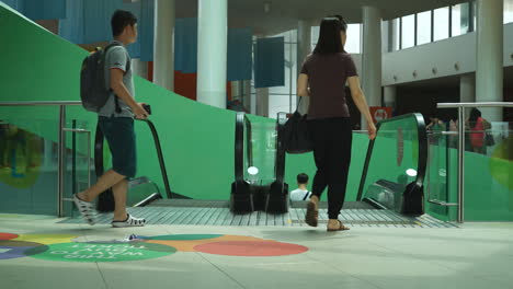 Singapore---Circa-Time-Lapse-of-landing-platform-of-a-set-of-up-and-down-escalators