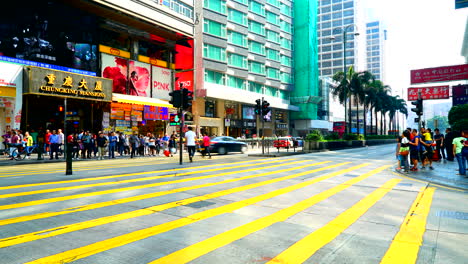 Hong-Kong---Alrededor-Del-Lapso-De-Tiempo-Del-Tráfico-De-La-Hora-Pico-De-Honk-Kong-Con-Autobuses-Y-Cruce-De-Peatones-En-China