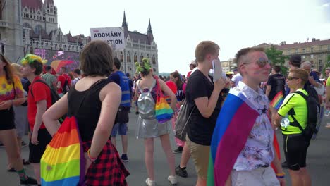 Colorful-people-getting-ready-to-march-in-the-Budapest-Pride,-Free-Hugs