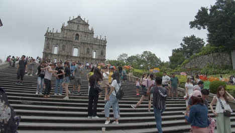 Tourists-walking-and-taking-pictures-on-the-stairs-near-Ruins-of-St