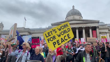 Protesters-hold-up-large-signs-at-the-Together-against-Trump-protest-in-central-London