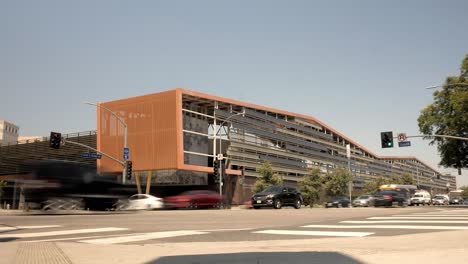 Intersection-in-Los-Angeles-Union-Station-with-cars-and-people-passing